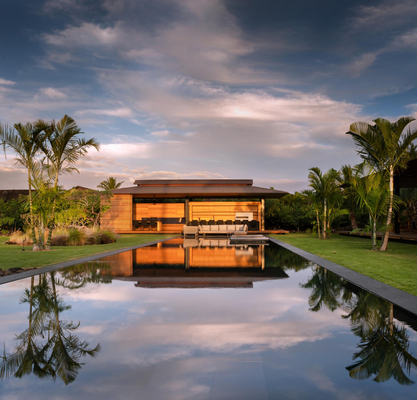 Island home surrounded by tropical landscaping